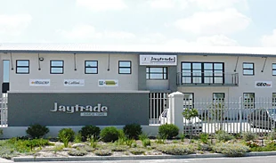 Jaytrade offices at Airport City behind palisade fencing